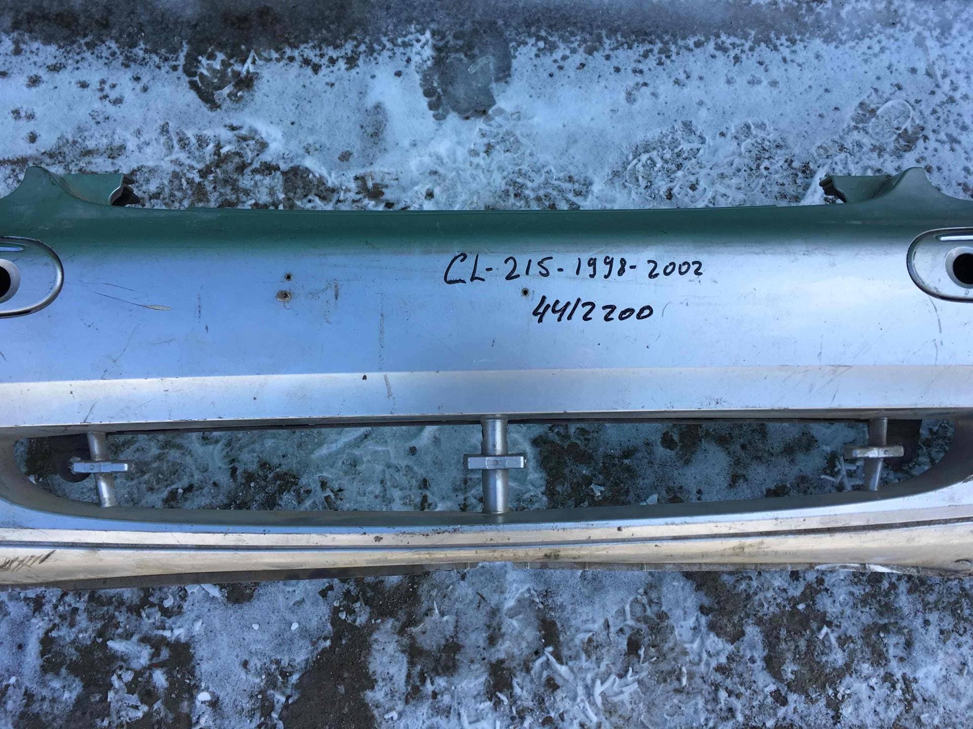 7772